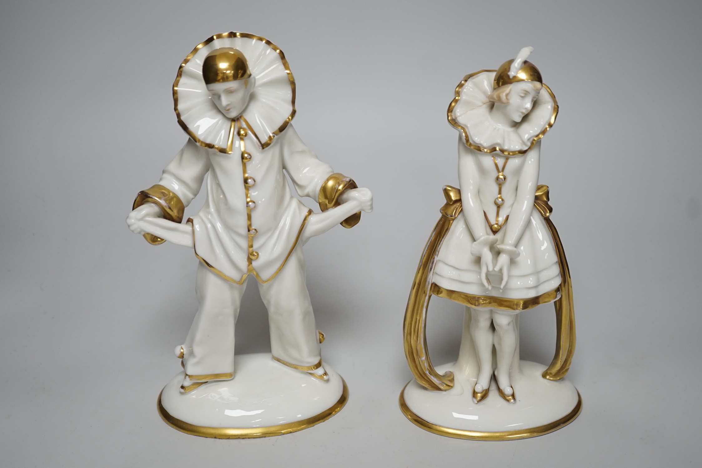 A pair of Sitzendorf Art Deco Pierrot figures, tallest 23cms high